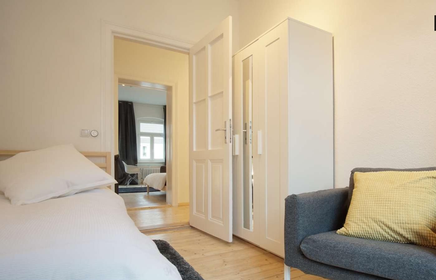 Sunny bedroom with single bed